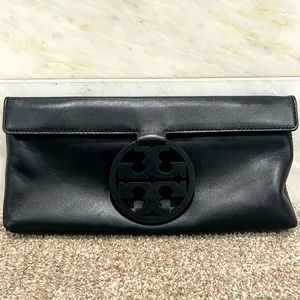 Tory Burch clutch. Black. In like new condition. Beautiful leather.